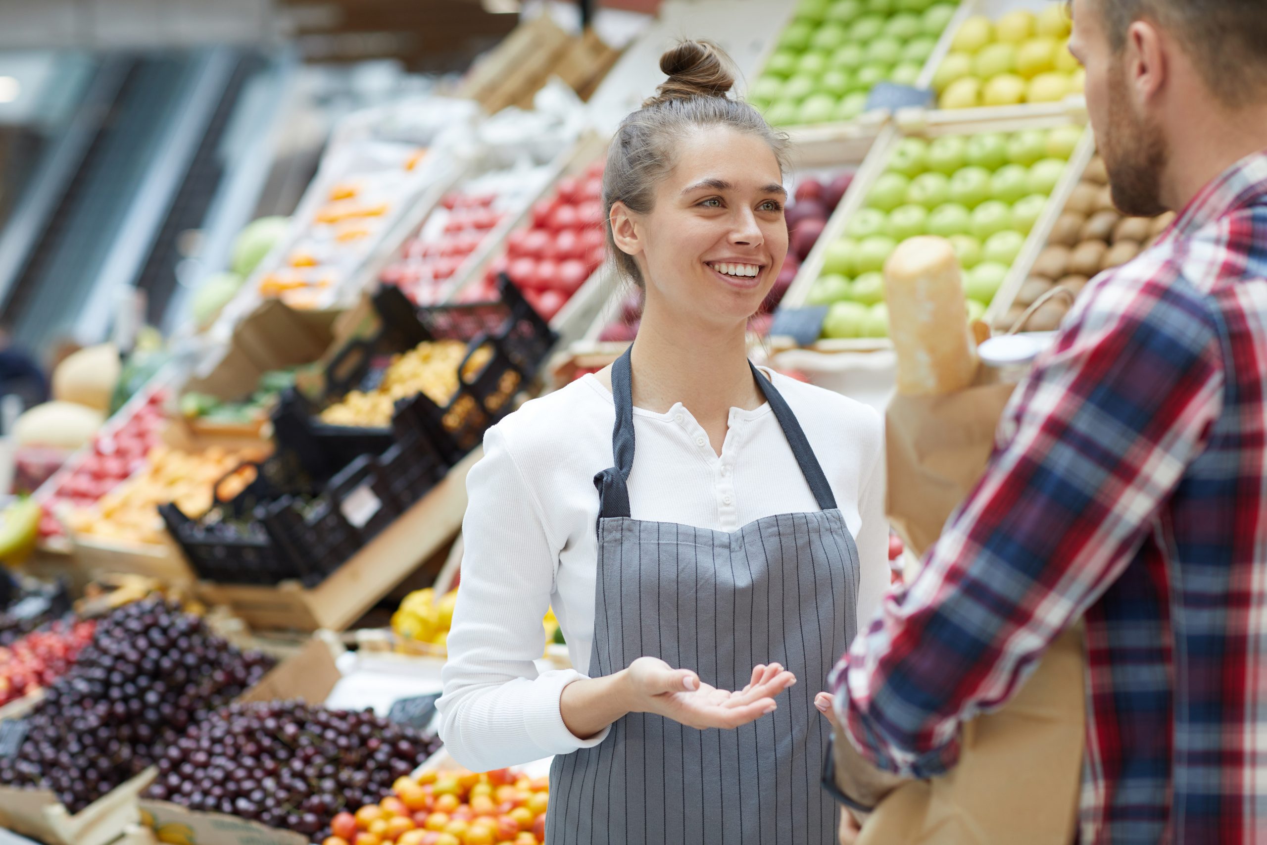 Shop Assistant Talking to Customer
